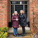 Diane O’Nions (left) and Ellen Moore (right) outside the Moore household in April.